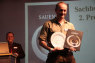 2. Platz Sachbuch: Heiko Schwartz nimmt den Preis für Siegfried Erker entgegen. (Foto:fh)